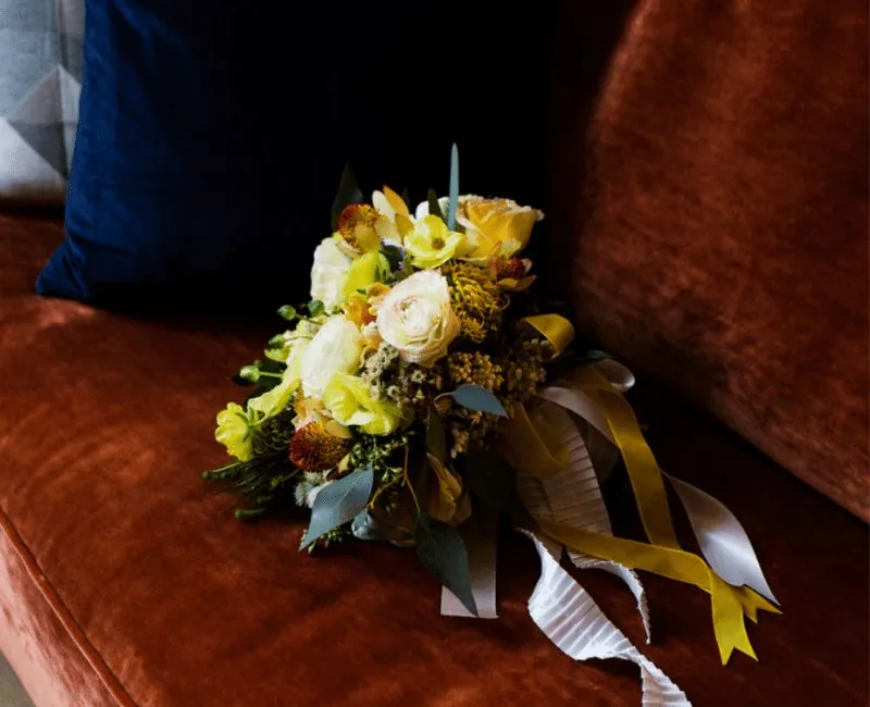Flower bouquets on a couch